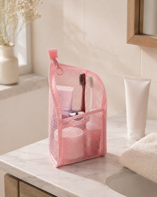 Pink organizer standing on a marble vanity